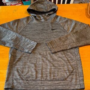 Nike Dri Fit pullover with front pocket. Size Large